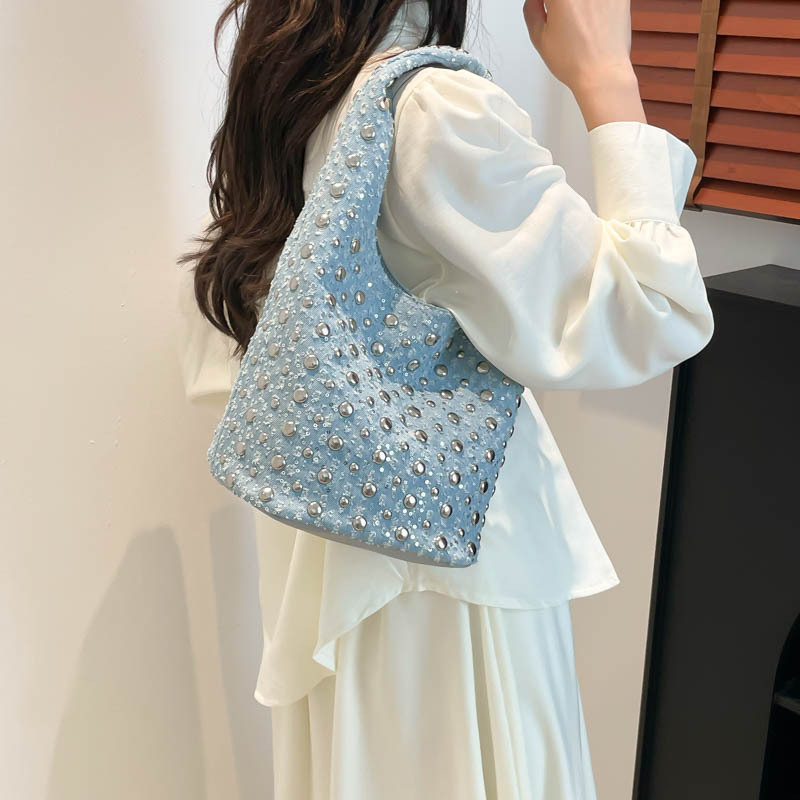 Bolso de cubo retro estilo Hong Kong 2025 nuevo bolso de mezclilla gypsophila remache bolso de hombro con lentejuelas de moda