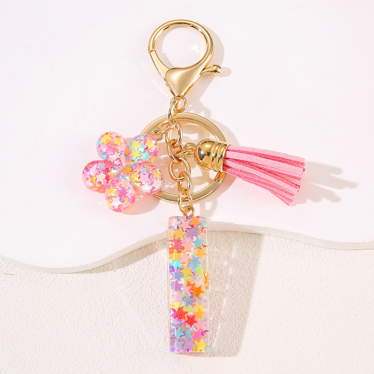 Un nuevo llavero flor de goteo de goma esquinilla 26 letras bolsos colgante llavero accesorios Yiwu