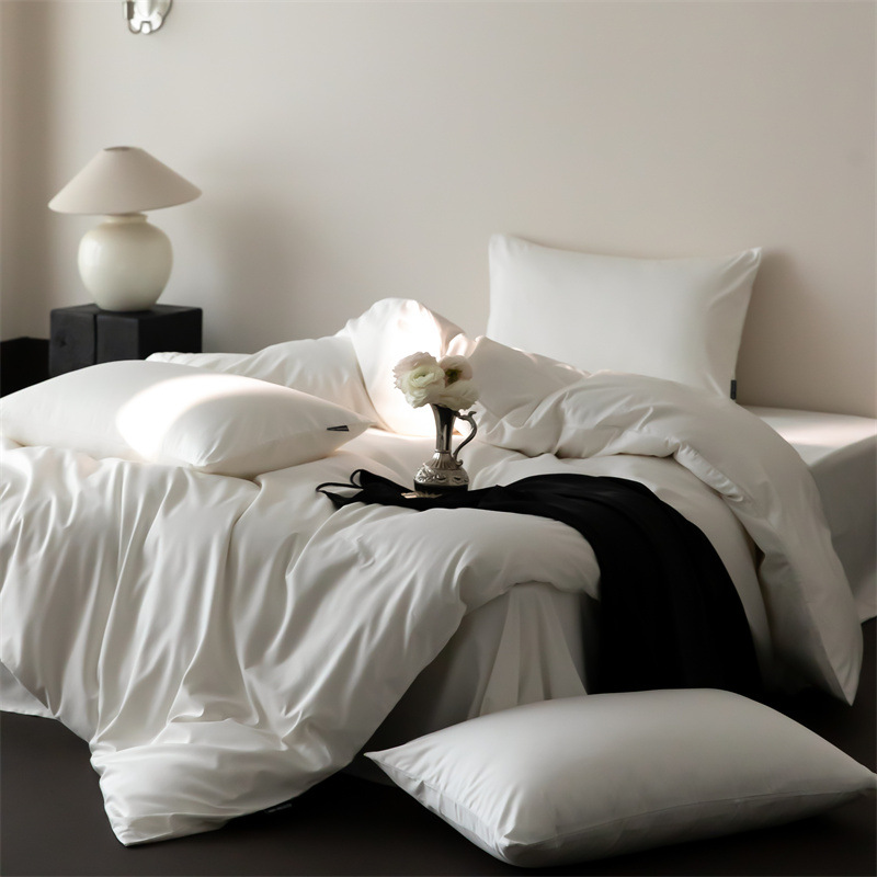 Cuatro estaciones Nantong algodón conjunto de cuatro piezas de color sólido lujo ligero alto sentido 60 algodón de lana larga delgado lujo ligero