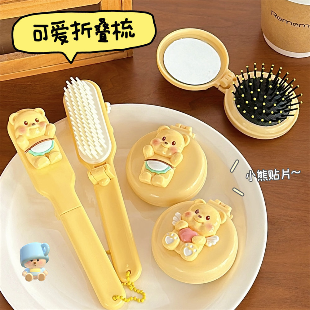 Caricatura encantadora oso de aire pein de airbag suave lindo corazón de niña plegable portátil mini pein de pelo pein pequeño