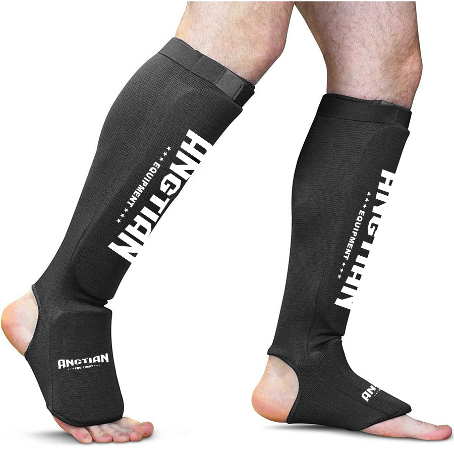 Fábrica Angtian personalizada de tejido para proteger las piernas de lucha Sanda Boxeo Muay Thai profesional para proteger las piernas