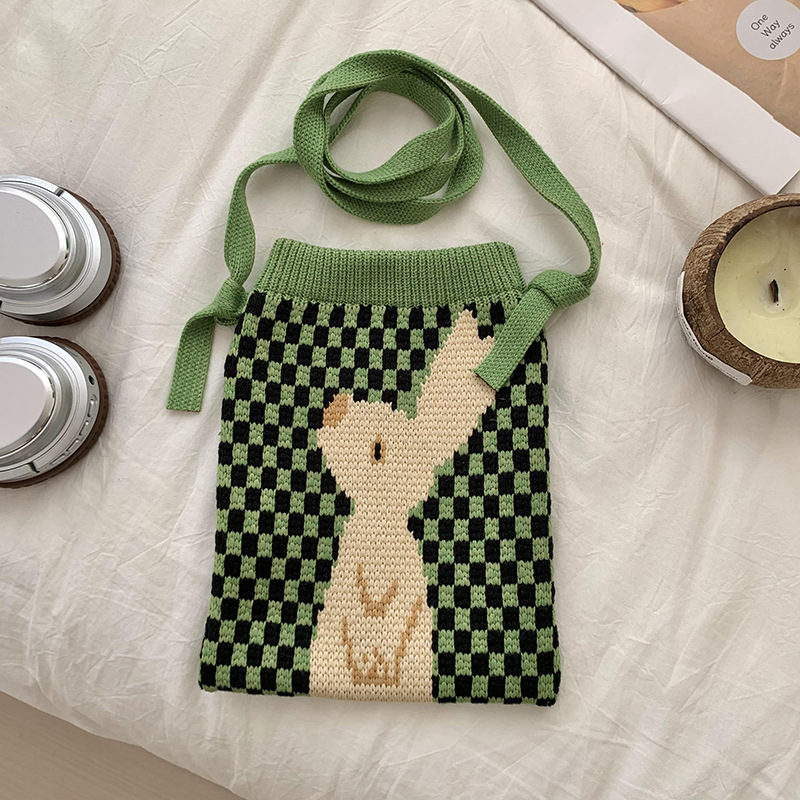 Bolso de hombro, bolso de mochila para mujeres versátil 2025 nuevo nicho de diseño lindo bolso de tejido de lana de dibujos animados bolso de teléfono celular