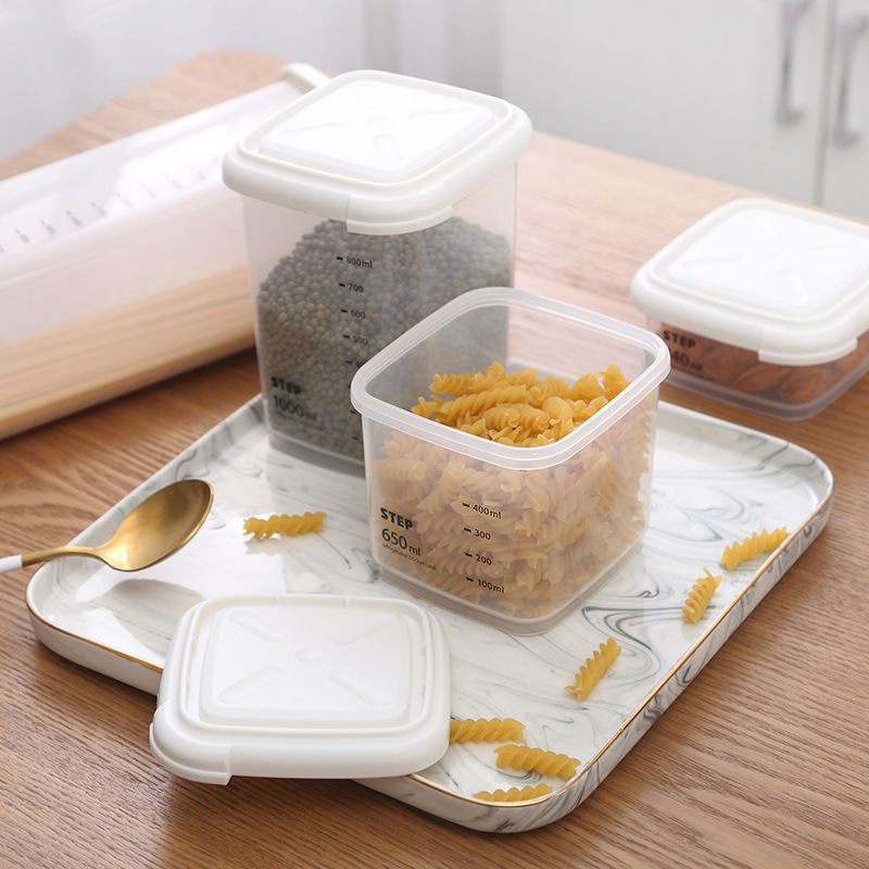 La cocina importada de Corea de Corea a prueba de humedad, caja de almacenamiento de alimentos de plástico, granos, frutas secas, galletas, tanques de almacenamiento.