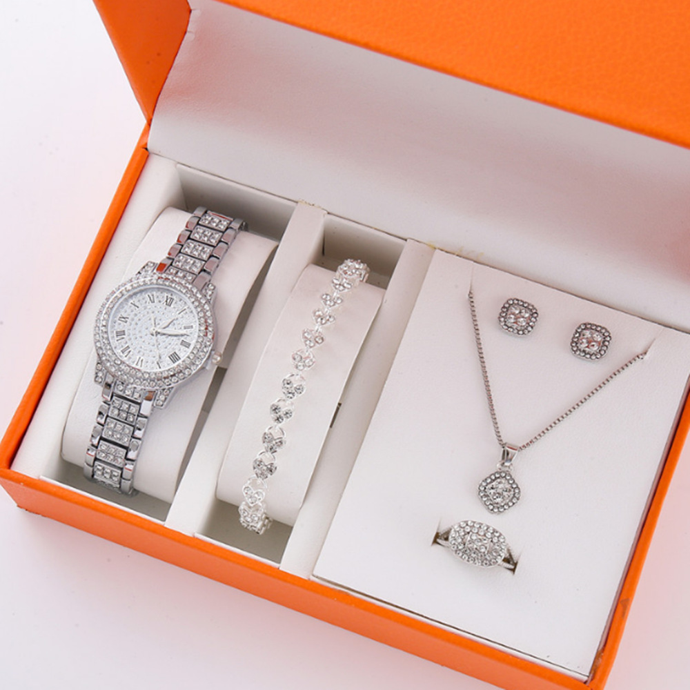 Nuevo producto para mujer 5pcs/set moda de nicho todo fósforo falso traje de reloj de cuarzo con cinturón de acero de tres ojos