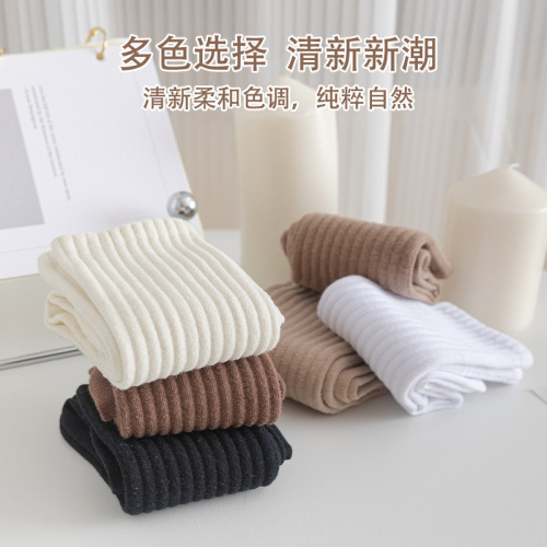 Pure cotton socks for women in autumn and winter mid-tube boneless pile socks Japanese style JK sports trendy long tube milk tea color women's stockings