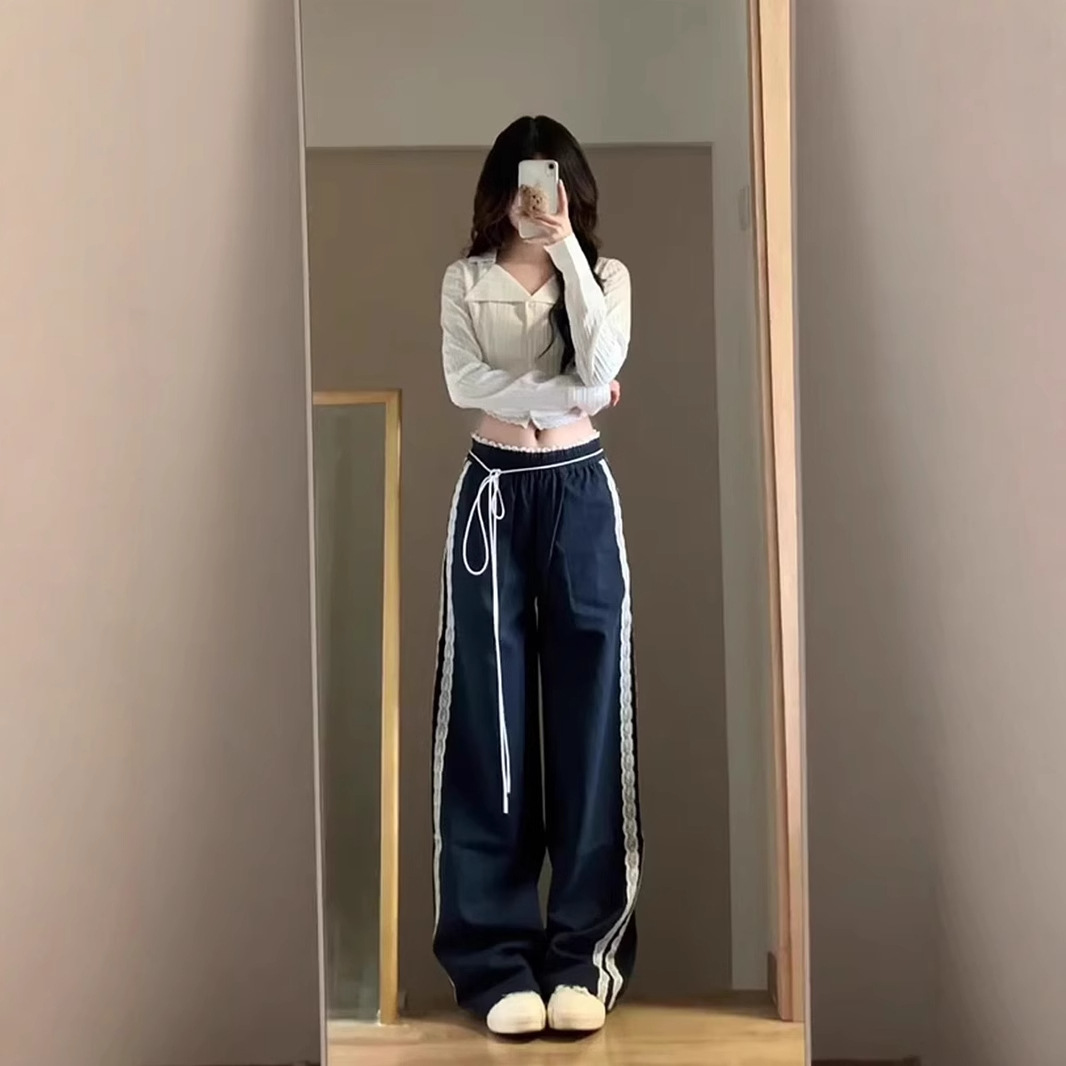 미국 스타일의 뜨거운 소녀 클로 바지 여성의 봄과 가을 새로운 느슨한 디자인 감각 작은 남자 스티칭 줄무늬 캐주얼 스포츠 바지