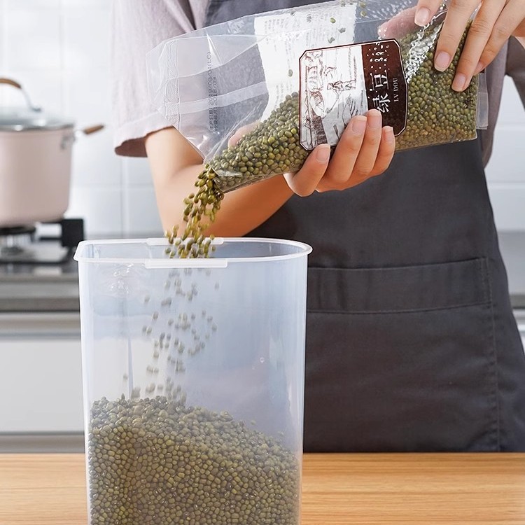 Venta caliente cinturón de plástico taza medidora cubo de arroz sellado caja de almacenamiento de arroz a prueba de humedad y a prueba de insectos tanque de almacenamiento de granos de cocina