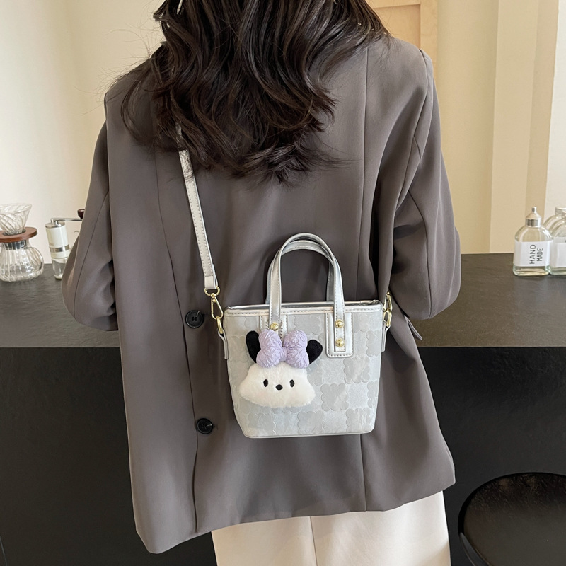 Bolsa de cubo de mano de moda coreana para mujeres primavera y verano 2024 nuevo nicho casual de moda universal mochila de hombro