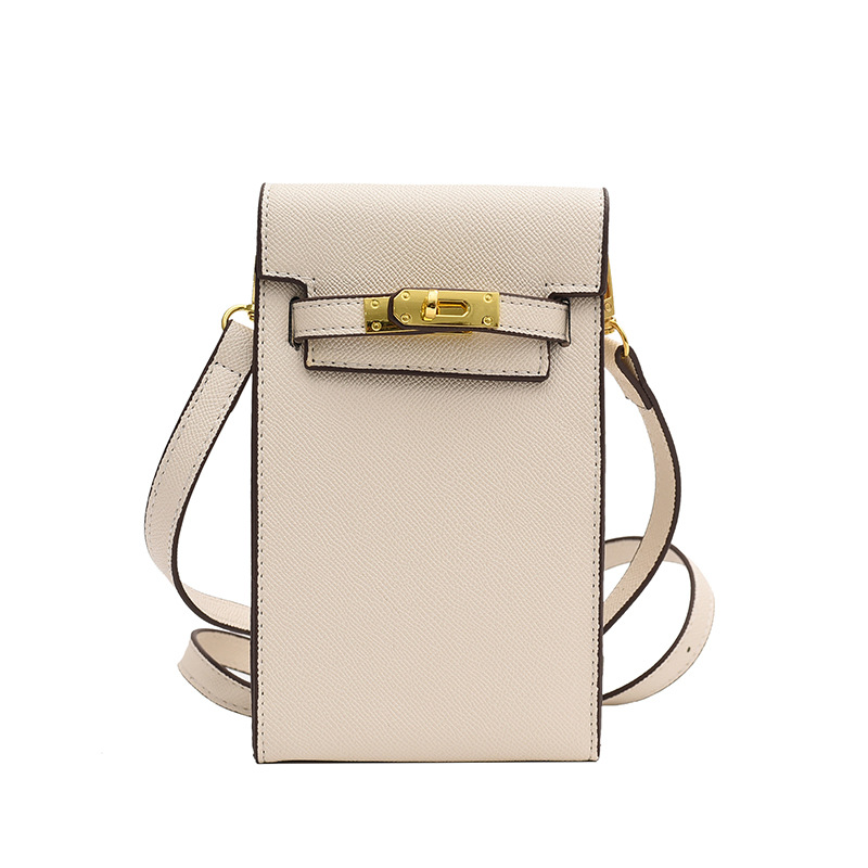 Bolsa pequeña texturizada para mujeres 2023 primavera y verano nueva moda retro bolsa de mensajero todo partido hombro teléfono móvil pequeña bolsa cuadrada