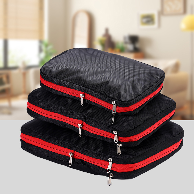 Bolsa de almacenamiento de compresión de viaje explosiva de Amazon Bolsa de almacenamiento de tres piezas de gran capacidad Juego completo de bolsa de almacenamiento de ropa impermeable