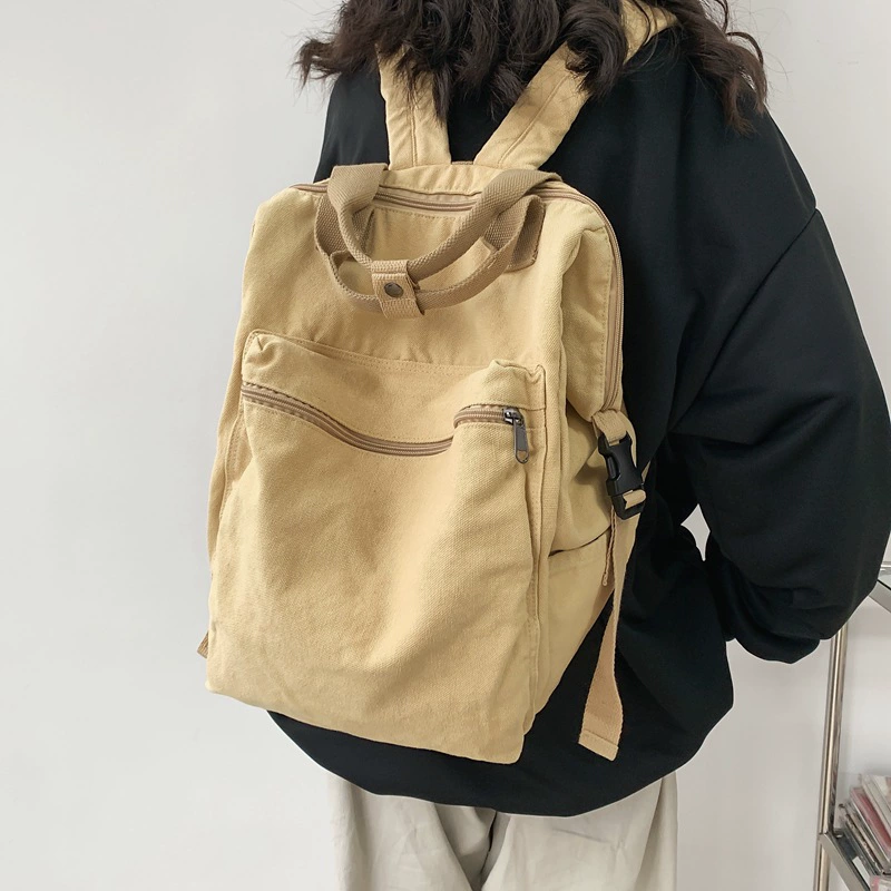 School bag for leisure, backpack, for students, Korean style, simple and elegant design, wholesale
