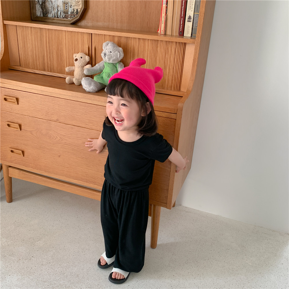 Corea del Sur ropa para niños al por mayor 2024 primavera y verano de los niños delgados color sólido desgaste del hogar traje bebé camiseta 7 pantalones dos piezas