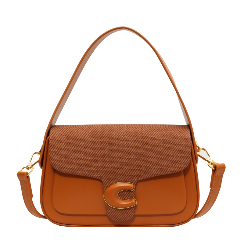 Libro rojo de tendencia retro contraste bolso portátil para mujeres 2024 nueva textura de alta calidad bolso de hombro