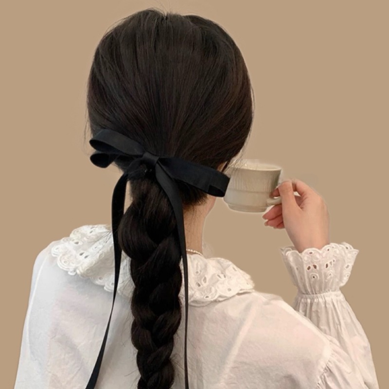 Черная заколка для волос с бантиком