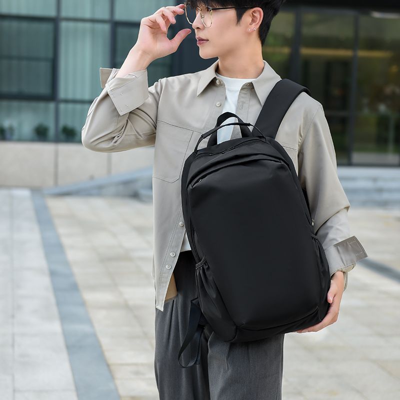 New men's lightweight backpack, casual, waterproof, large capacity, suitable for travel, students, and carrying a laptop or books, trendy design