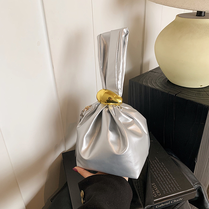 Bolsa de cubo simple y casual, 2025 primavera nueva moda coreana bolso de mano de alta belleza bolsa de mujer decoración