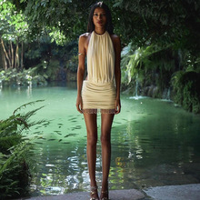 欧美跨境2025夏季新款女装性感辣妹挂脖无袖拼接流苏珠包臀连衣裙