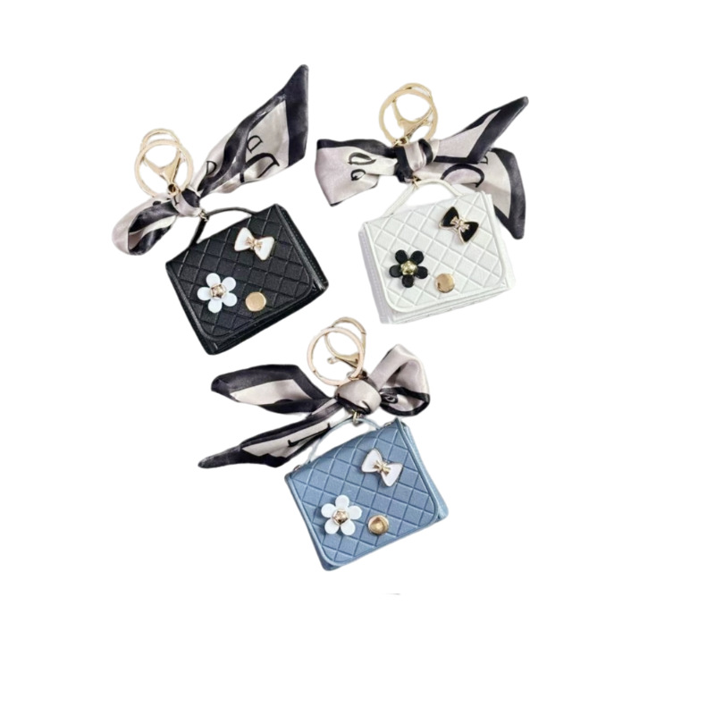 Nuevo estilo transfronterizo, moderno y exclusivo mini bolso acolchado tipo colgante, monedero para llaves, accesorio para auriculares.