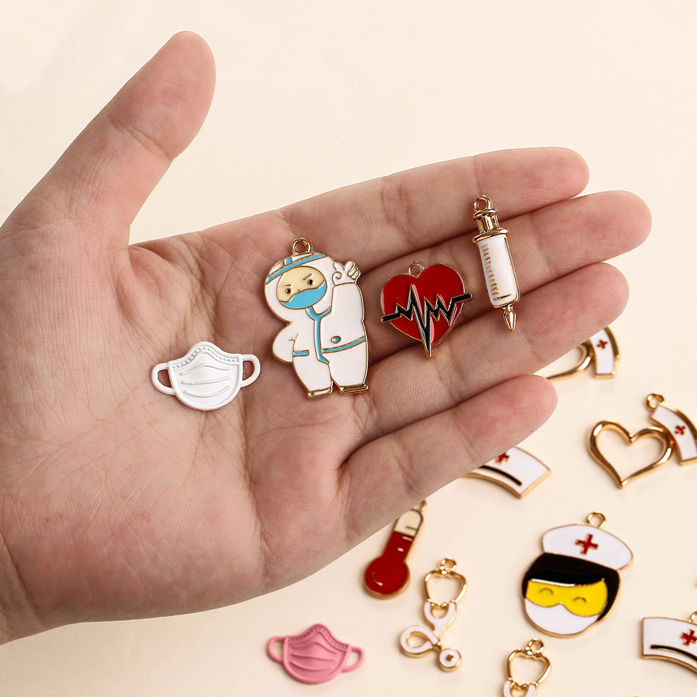 Hole 1~1.9mm, Hole 2~2.9mm Hole Size 10 PCS/Package Quantity 10 PCS/Package 23*32.5mm 27*26mm 8.5*30mm Hole 1~1.9mm Hole 2~2.9mm Alloy Human Face Mask Heart Shape Pendant