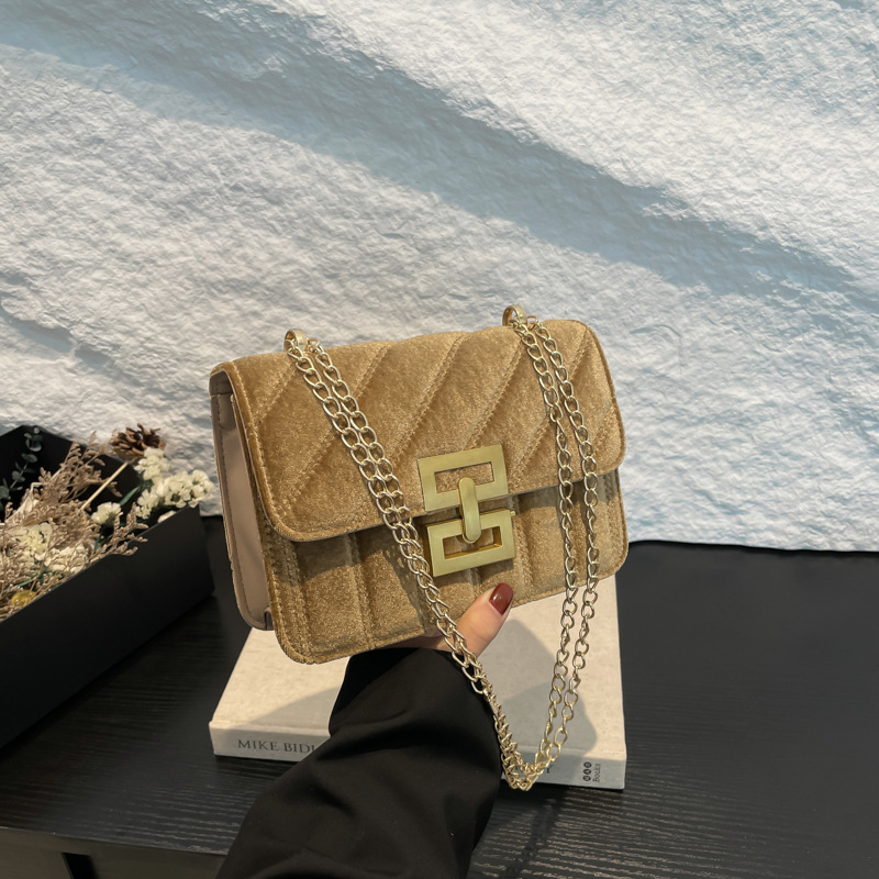Bolso de mujer de moda extranjera simple mochila retro textura alta primavera 2025 nueva moda bolso de hombro pequeño
