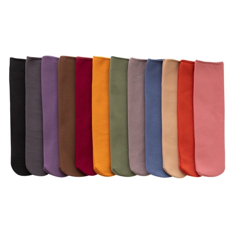 Calcetines de media pantorrilla de otoño e invierno rayas verticales imitación Cachemira calcetines de nieve hombres y mujeres de lana forrada gruesa antideslizante calcetines de piso caliente