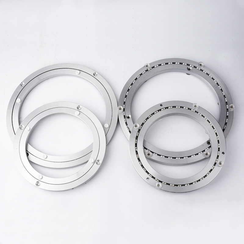 Mesa de comedor de aleación de aluminio mesa de comedor de hotel mesa de cristal silenciador placa giratoria bola sólida base redonda al por mayor