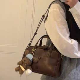 南枫新款时尚伯恩邮报枕头包2025超火通勤包包女手提包单肩斜挎包