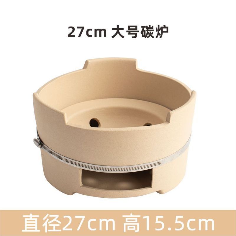 古い陶土オシドリ鍋は辺炉を打って木の炭素のストーブを燃やします。|undefined