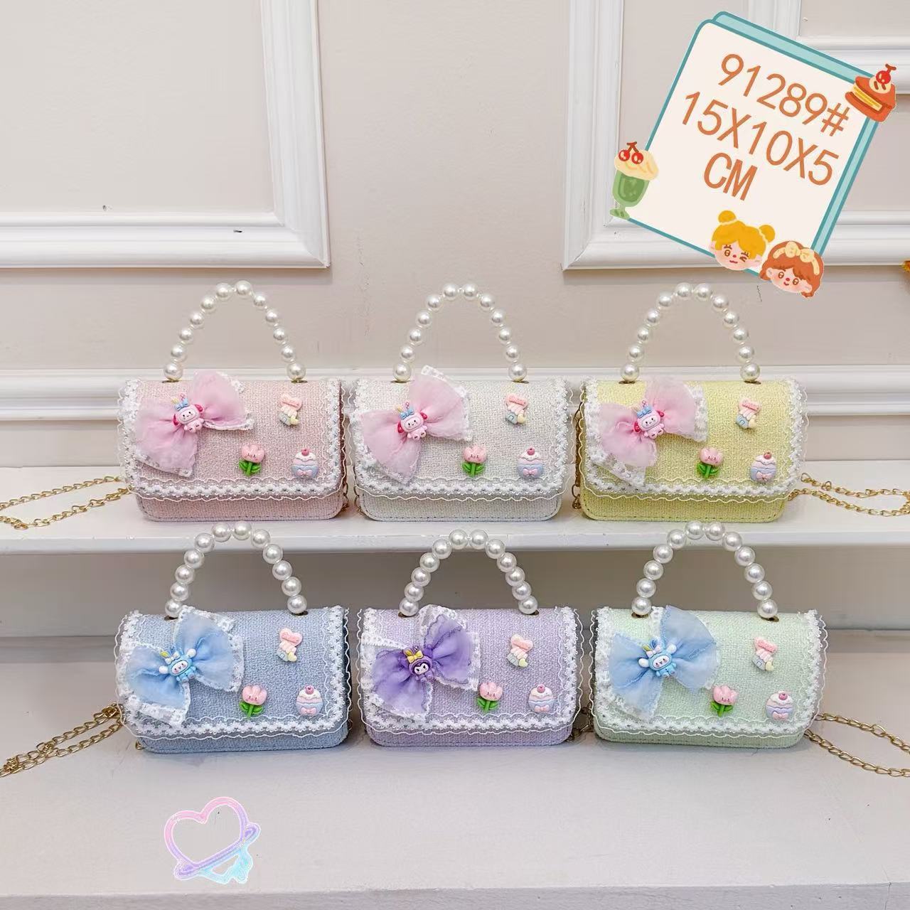 Nuevo comercio exterior pequeña fragancia niñas hombro mochila de moda perla arco bolsos de niños bolsos de cambio de dibujos animados