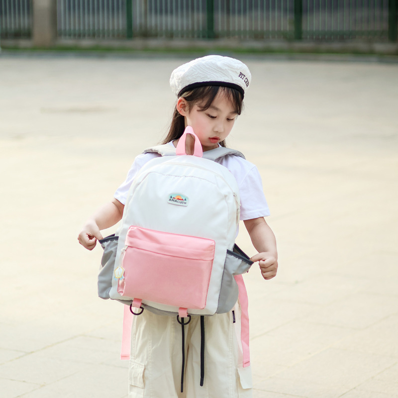 2025 mochila de moda coreana para niños y niñas, mochila para niños de jardín de infantes, nueva mochila para niños de color exterior