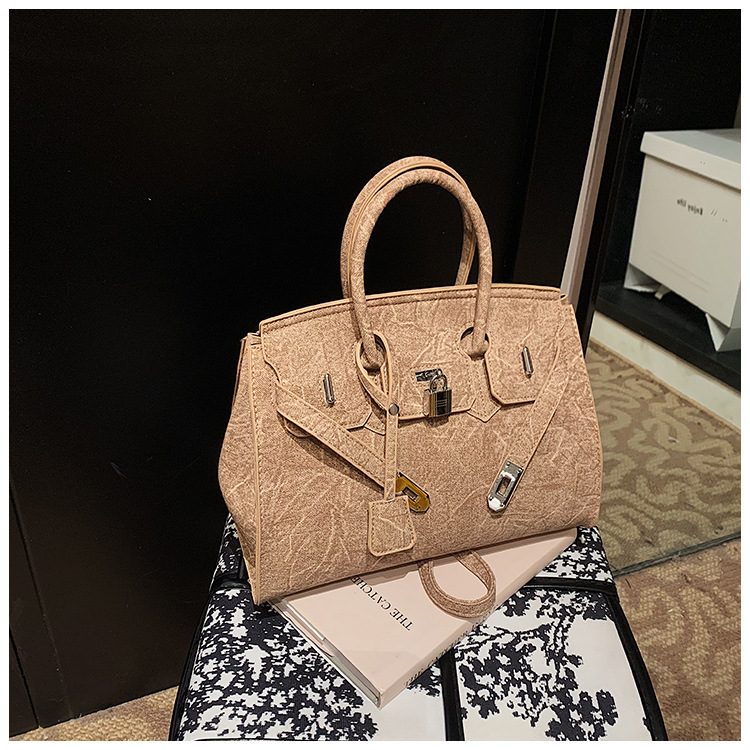 Bolso de platino simple retro ventas calientes de mujeres nuevas moda transfronterizas de alta calidad Kelly bolso de hombro de gran capacidad