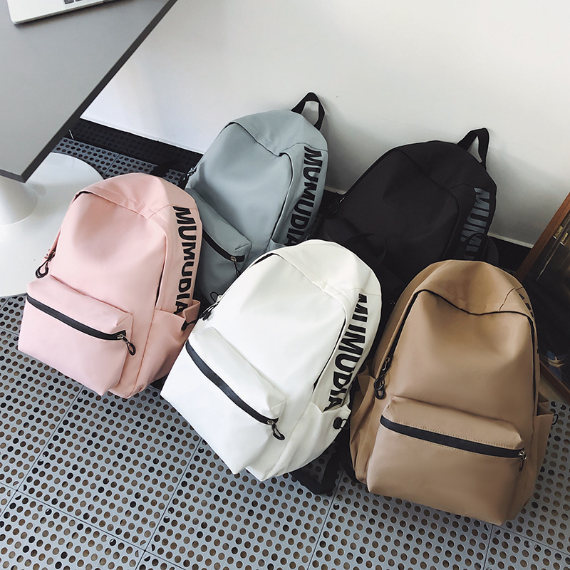 Nuevo estilo coreano en una pequeña mochila de color sólido fresco, mochila de gran capacidad, mochila de alto valor, mochila de estudiantes de moda.