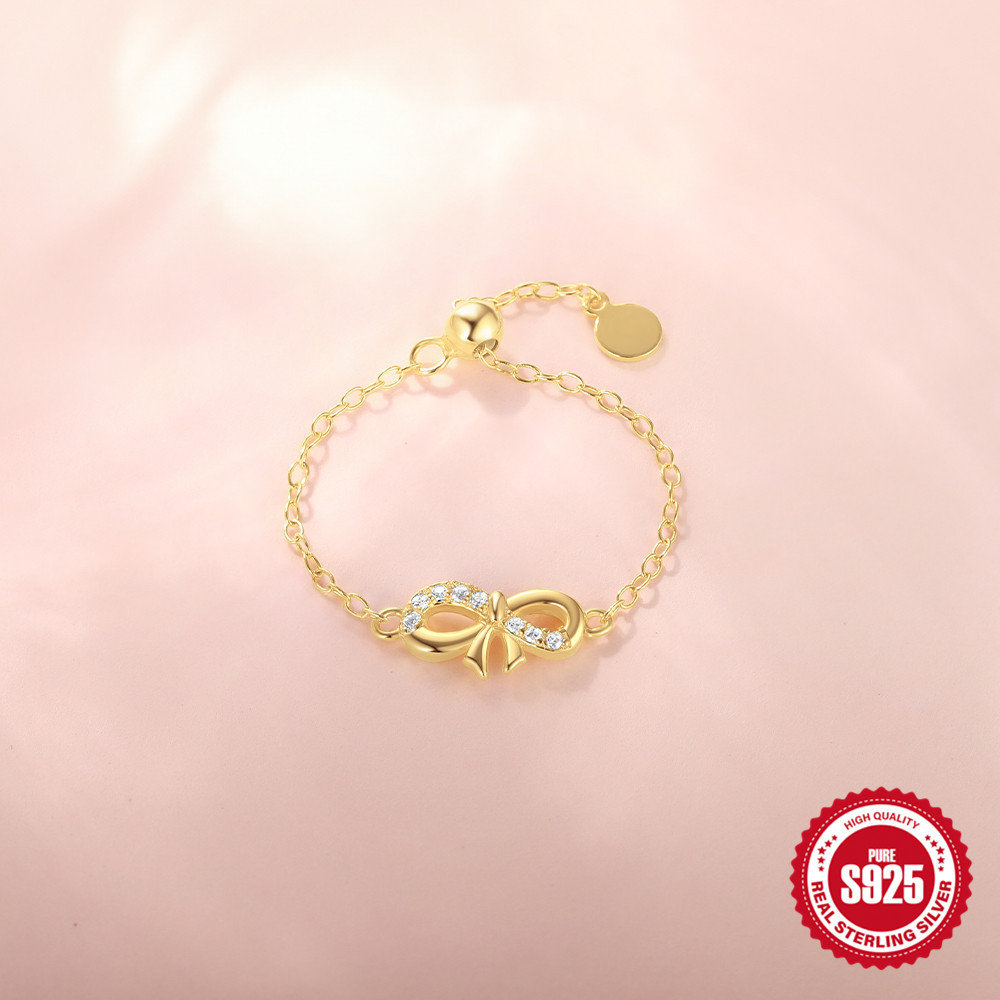 Anillo de circón con incrustaciones de lazo infinito, apertura femenina, anillo de cadena ajustable de lujo ligero plateado S925 de moda europea y americana