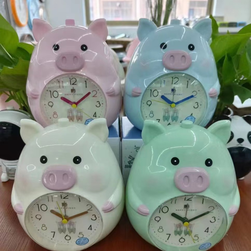 Fábrica al por mayor dormir cerdo reloj de alarma de voz de doble tono reloj de alarma especial para niños caminar es muy preciso y puede ser cronometrado reloj de alarma