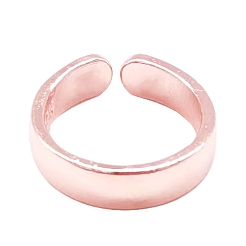 Pulseras de pareja populares europeas y americanas, joyería de metal con superficie lisa, magnética, ajustable y de extremo abierto para hombres y mujeres.