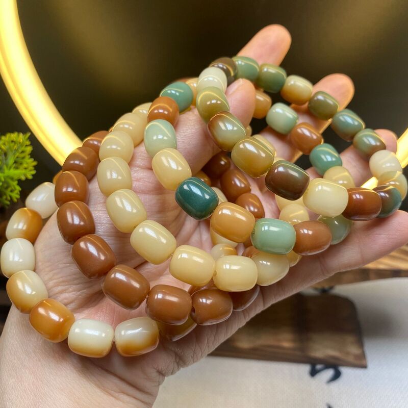 Popular small rice cake Bodhi root bracelet Dunhuang charcoal burnt weathering milk yellow multi-treasure color rice cake-shaped Buddha beads soft around fingers Popular small rice cake Bodhi root bracelet Dunhuang charcoal burnt weathering milk yellow multi-treasure color rice cake-shaped Buddha beads soft around fingers