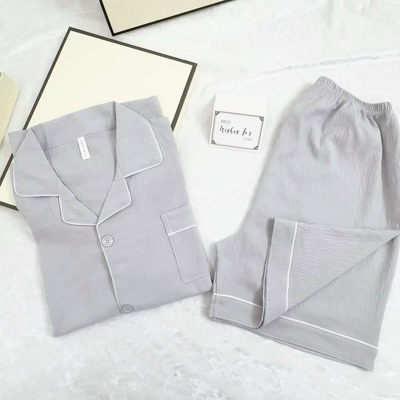 Pijamas de algodón de nube de solapa transfronteriza al por mayor cardigan para hombres pantalones cortos de manga corta de verano de dos piezas de color sólido