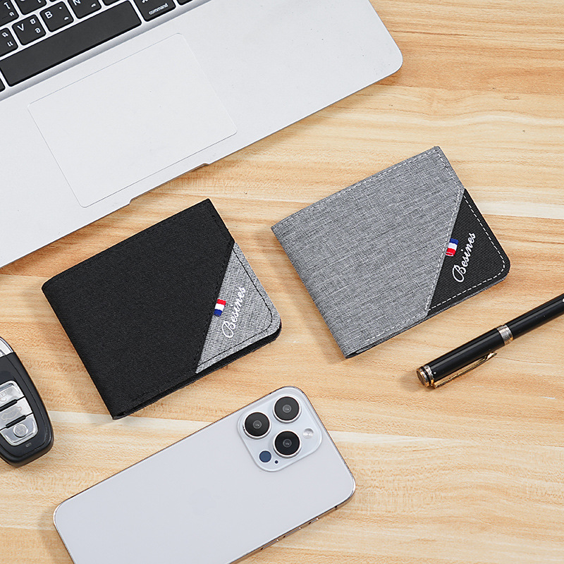 Cartera de color en contraste para hombre corta 2025 nueva marca de moda joven estudiante personalidad simple clip de camioneta plegable ultrafino