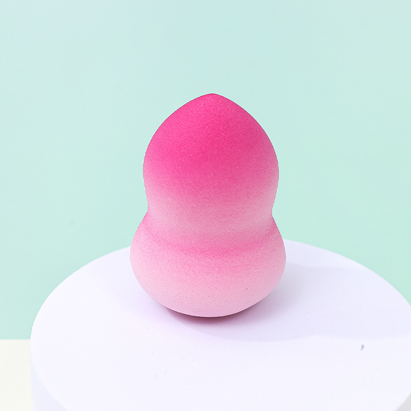 Estilo transfronterizo color degradado maquillaje de huevo soplo de polvo no látex color spray en forma de calabaza maquillaje esponja maquillaje huevo personalizado de fábrica