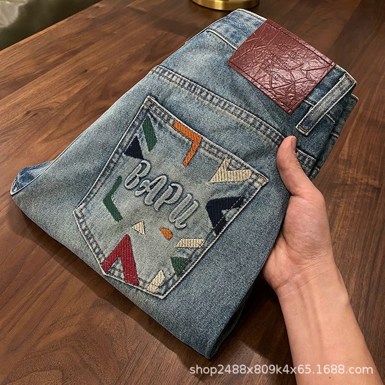 Trendy embroidered denim pants for men, 2026 spring/autumn new collection, American-style loose-fit straight-leg pants, versatile harem-style cropped pants