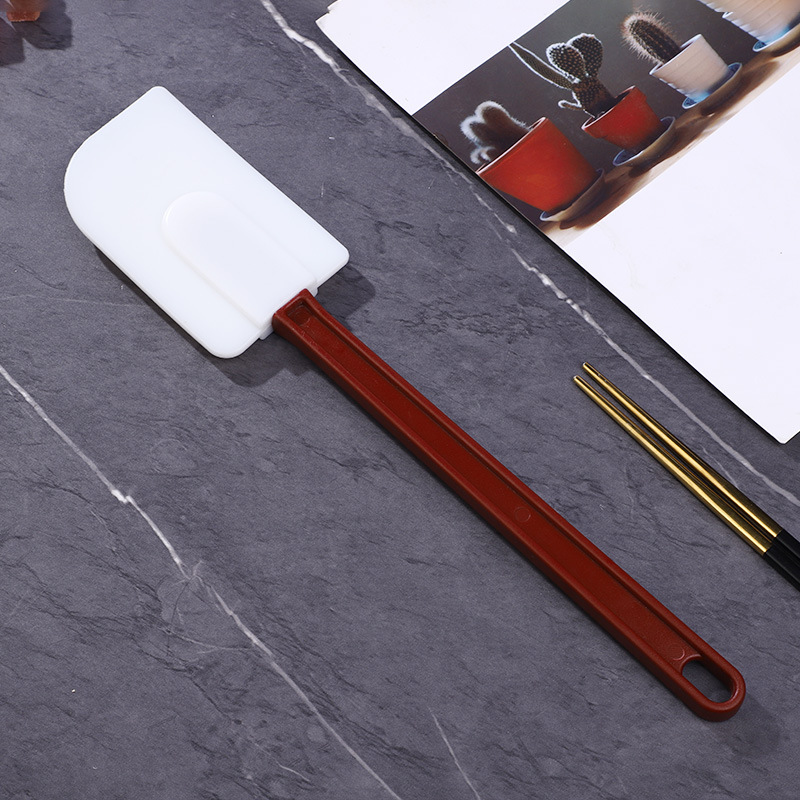 Producción al por mayor crema raspador tipo hornada espátula gancho tipo cuchara tipo EVA pastel raspador de silicona