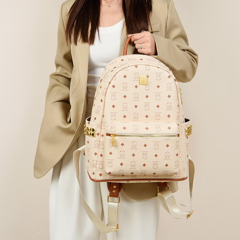 Moda coreana de gran capacidad mochila caricatura lindo oso mochila 2025 nueva mochila de remaches universitarios