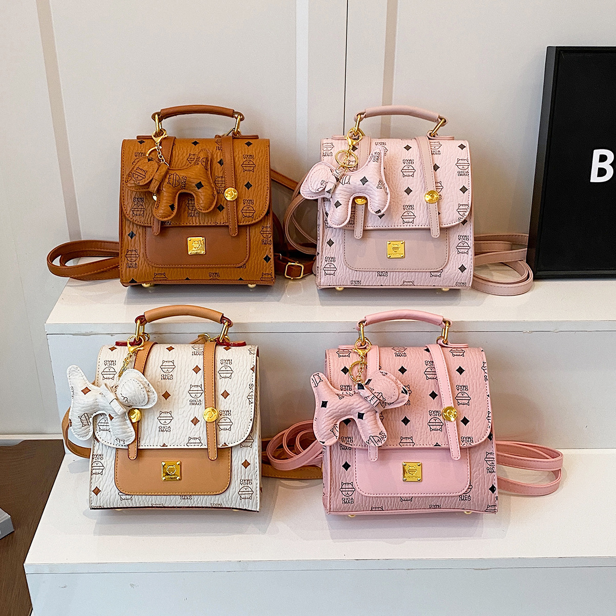 Mochila de moda coreana para mujer, bolso de mensajero con estampado de moda ringge de estilo occidental, bolso de viaje con colgante de cachorro lindo