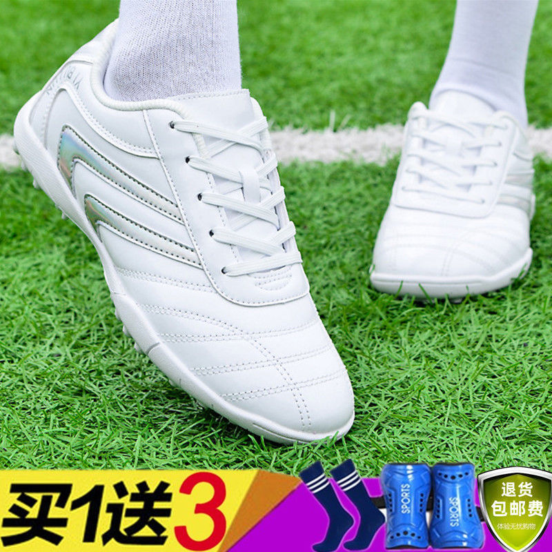 Zapatos de fútbol profesionales de mujeres TF clavos de interior niños adultos de primaria y secundaria zapatos de entrenamiento de niños clavos cortos comercio exterior
