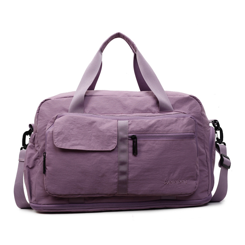Bolsa de viaje de corta distancia portátil transfronteriza nueva bolsa de almacenamiento portátil de gran capacidad bolsa de yoga de fitness al aire libre bolsa de lona mujer