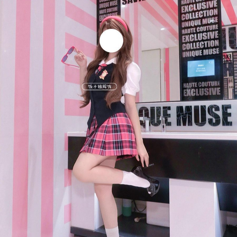 Miss Delancy's Jk Uniform Outfit Includes a Black Vest Layered over a Short-Sleeved Shirt Top Paired with a Plaid Skirt Barbie Set Miss Delancy's Jk Uniform Outfit Includes a Black Vest Layered over a Short-Sleeved Shirt Top Paired with a Plaid Skirt Barbie Set