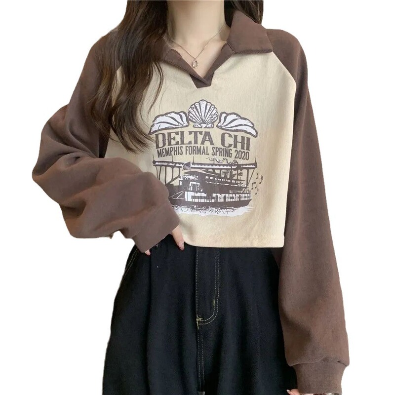 大きいサイズの太ったmmはやせているショートカーディガンの女性の長袖の秋の服のデザイン感のプリントのpoloの襟のゆったりしているカバーの上着を出します。|undefined