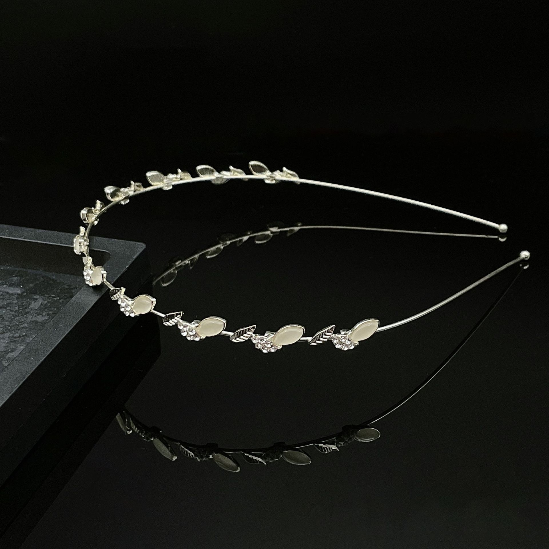 Accesorios para el cabello de alto sentido femenino Socialite nicho súper Hada temperamento diadema dulce ojo de gato perla diadema accesorios para el cabello francés