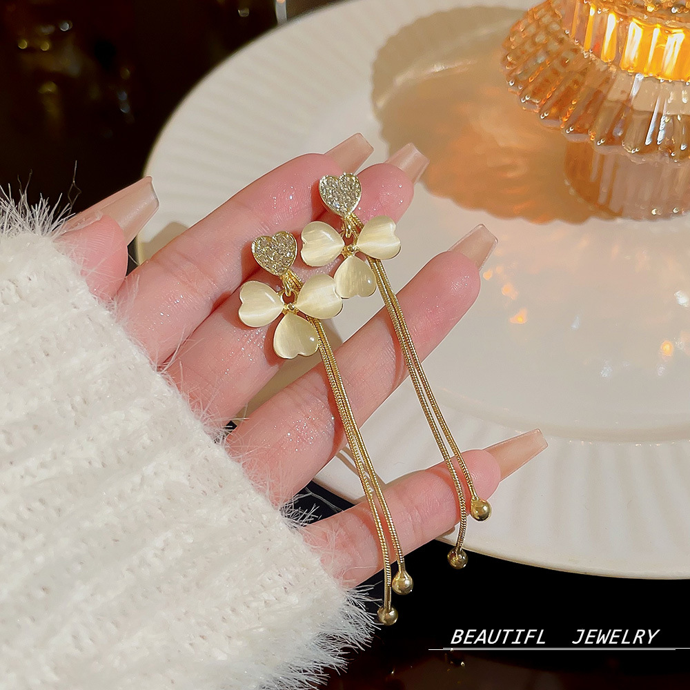 Elegant small design fashionable earrings from pearl with zircon