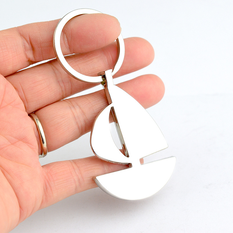 Creative sailing car keychain metal pendant can be customized smooth auspicious company gift gifts